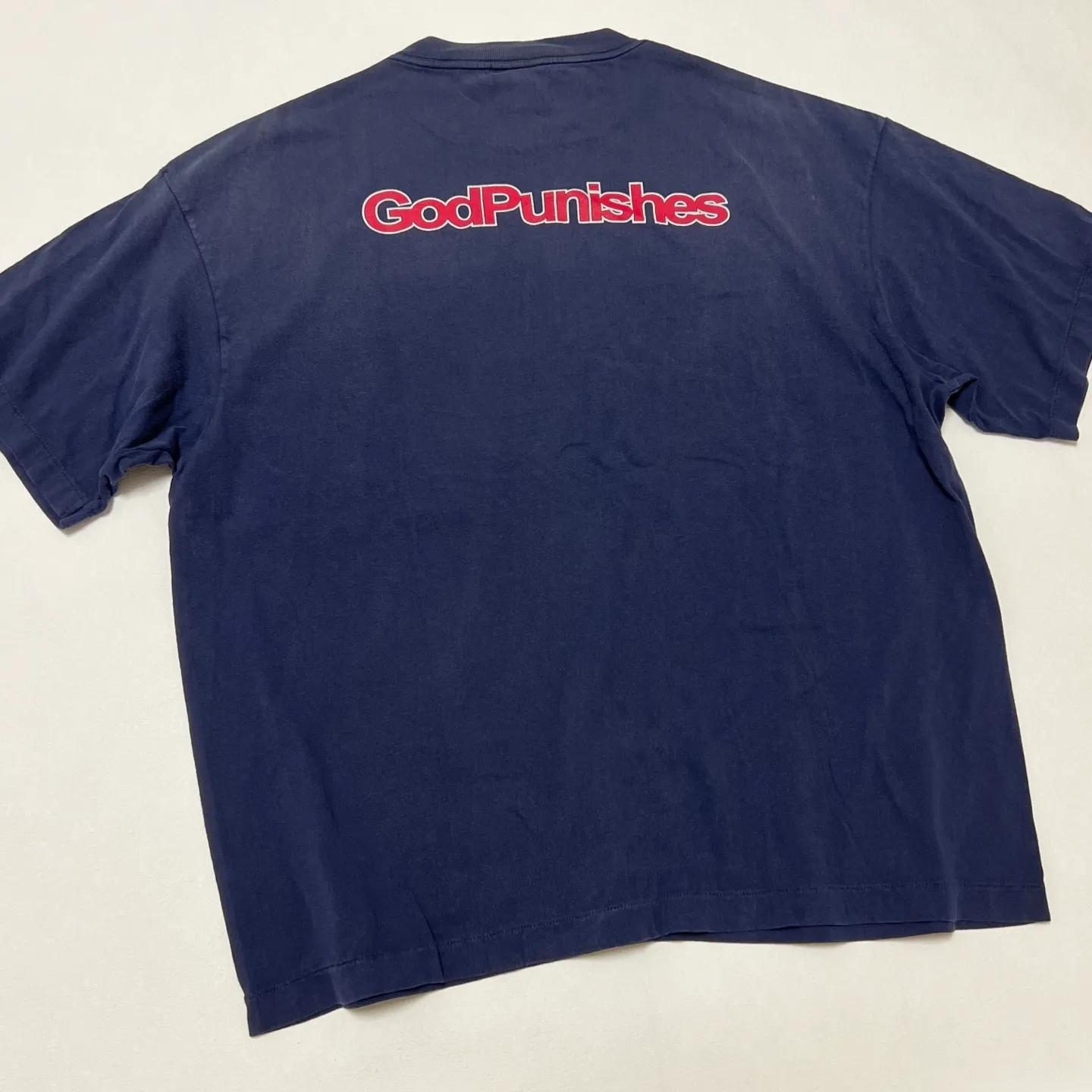 SAINT Mxxxxxx DEAD SAINT SS TEE/NAVY DEAD SAINT printed short sleeves God's Punishment TEE Washed blue S-XL Genuine consistent tube weaving without side seams High weight OE yarn fabric Assute dyeing Multiple horse fades Heavy wash water Worn holes Original consistent main mark/wash mark/little angel anti-counterfeiting mark